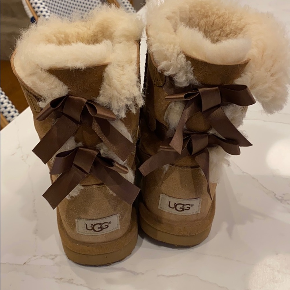 Girls chestnut UGGS with bows